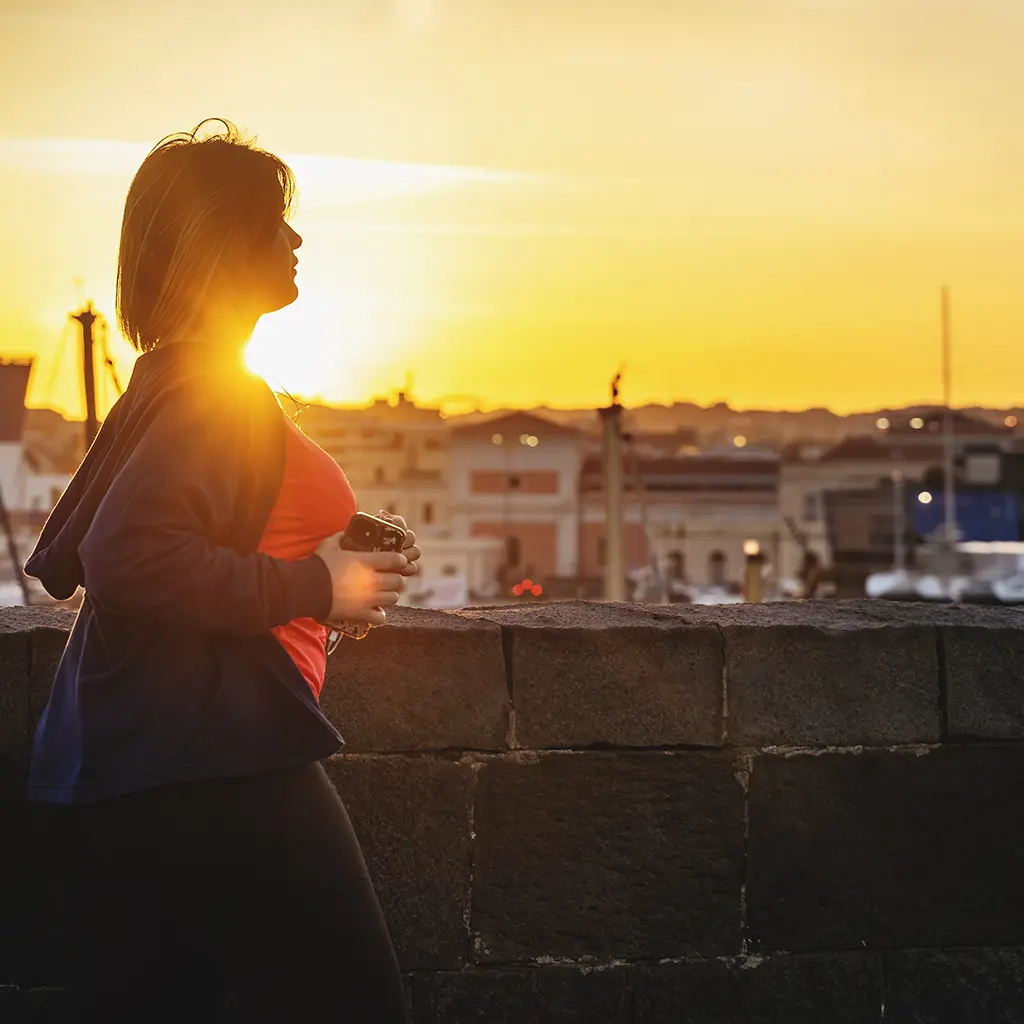 A woman on a walk, thinking about her medical weight loss journey